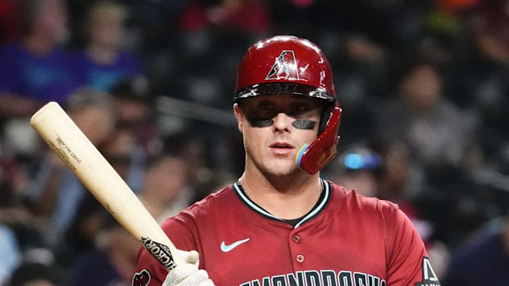 Arizona Diamondbacks James McCann bats against the Cleveland Guardians in the 2nd inning at Chase Field on Aug. 20, 2025.