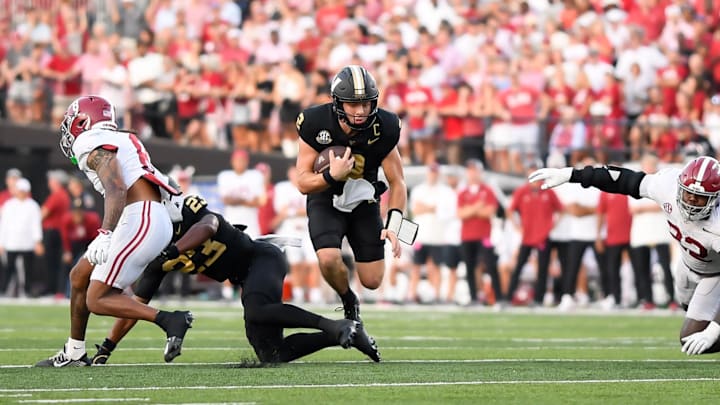 Oct 5, 2024; Nashville, Tennessee, USA;  Vanderbilt Commodores quarterback Diego Pavia (2) runs the ball against the Vanderbilt Commodores during the second half at FirstBank Stadium. 