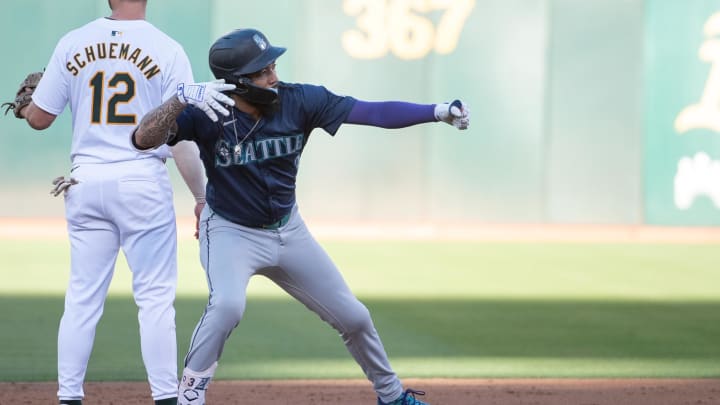 Seattle Mariners shortstop J.P. Crawford (3) motions to his team mates after hitting a double against the Oakland Athletics during the second inning at Oakland-Alameda County Coliseum on June 4. Seattle Mariners shortstop J.P. Crawford (3) motions to his team mates after hitting a double against the Oakland Athletics during the second inning at Oakland-Alameda County Coliseum on June 4.