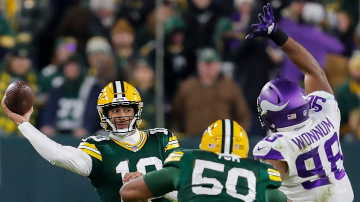 Green Bay Packers quarterback Jordan Love (10) passes the ball against the Minnesota Vikings on