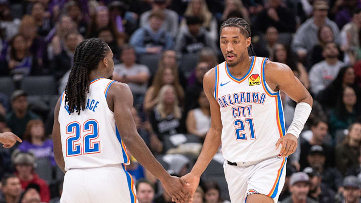 Nov 25, 2024; Sacramento, California, USA; Oklahoma City Thunder guard Cason Wallace (22) high fives guard Aaron Wiggins (21) during the second quarter of the game against the Sacramento Kings at Golden 1 Center. Mandatory Credit: Ed Szczepanski-Imagn Images Nov 25, 2024; Sacramento, California, USA; Oklahoma City Thunder guard Cason Wallace (22) high fives guard Aaron Wiggins (21) during the second quarter of the game against the Sacramento Kings at Golden 1 Center. Mandatory Credit: Ed Szczepanski-Imagn Images