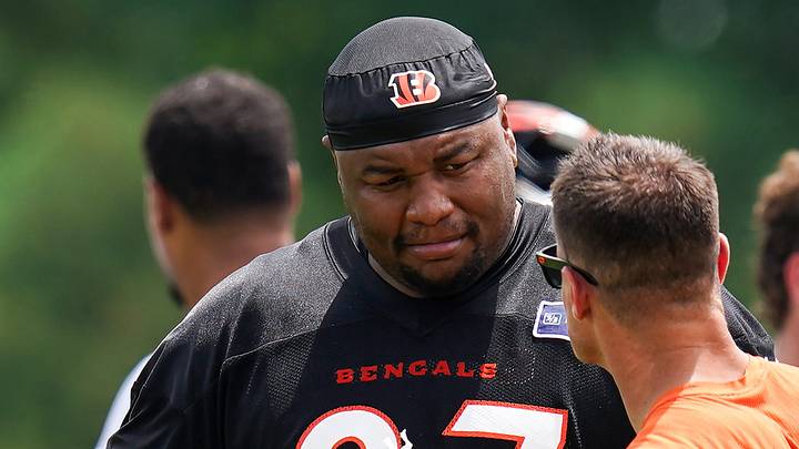 Cincinnati Bengals defensive tackle Dexter Lawrence II (97) unwraps his fingers during practice on Tuesday, June 9, 2026, at Kettering Health Practice Fields in downtown Cincinnati. Cincinnati Bengals defensive tackle Dexter Lawrence II (97) unwraps his fingers during practice on Tuesday, June 9, 2026, at Kettering Health Practice Fields in downtown Cincinnati.