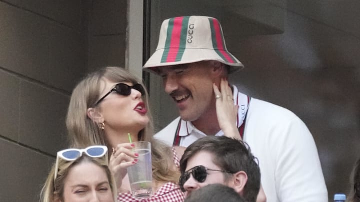 Sep 8, 2024; Flushing, NY, USA; Recording artist Taylor Swift and Kansas City Chiefs tight end Travis Kelce talk during the men’s singles final of the 2024 U.S. Open tennis tournament