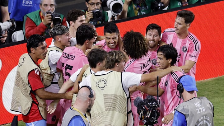 [Subscription Customers Only] Jun 23, 2025; Miami Gardens, Florida, USA; Inter Miami CF forward Luis Suarez (9) celebrates with teammate after scoring against SE Palmeiras during the second half of a group stage match of the 2025 FIFA Club World Cup at Hard Rock Stadium. Mandatory Credit: Marco Bello-Reuters via Imagn Images