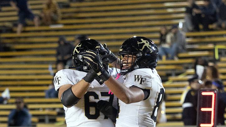 Oct 17, 2026; Berkeley, California, USA; Wake Forest Demon Deacons tight end Dominick Barry (84) celebrates his touchdown reception with teammate Elliot Demaine (67) during the third quarter against the California Golden Bears at California Memorial Stadium. Mandatory Credit: D. Ross Cameron-Imagn Images Oct 17, 2026; Berkeley, California, USA; Wake Forest Demon Deacons tight end Dominick Barry (84) celebrates his touchdown reception with teammate Elliot Demaine (67) during the third quarter against the California Golden Bears at California Memorial Stadium. Mandatory Credit: D. Ross Cameron-Imagn Images