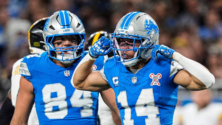 Detroit Lions wide receiver Amon-Ra St. Brown (14) celebrates a first down against Pittsburgh Steelers during the first half at Ford Field in Detroit on Sunday, Dec. 21, 2025.