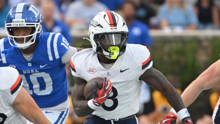 Nov 15, 2025; Durham, North Carolina, USA;  Virginia Cavaliers running back J'Mari Taylor (3) runs the ball during the first quarter against the Duke Blue Devils at Wallace Wade Stadium. Mandatory Credit: Zachary Taft-Imagn Images