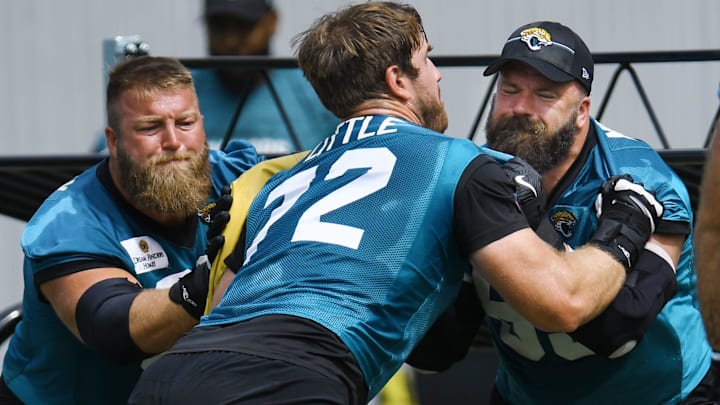 Jacksonville Jaguars center Tyler Shatley (69) and center Mitch Morse (65) face off with offensive tackle Walker Little (72) during the organized team activity session Monday, June 3, 2024 at EverBank StadiumÕs Miller Electric Center in Jacksonville, Fla. 