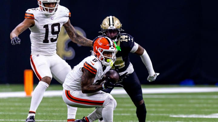 Nov 17, 2024; New Orleans, Louisiana, USA;  Cleveland Browns wide receiver Elijah Moore (8) catches a pass against New Orleans Saints cornerback Kool-Aid McKinstry (14) during the second half at Caesars Superdome. Mandatory Credit: Stephen Lew-Imagn Images