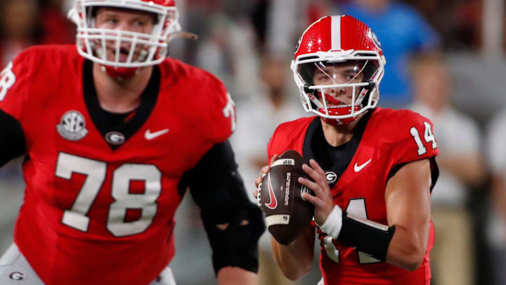 Georgia quarterback Gunner Stockton (14) looks to throw a pass during the second half of a NCAA college football game against Tennessee Martin in Athens, Ga., on Saturday, Sept. 2, 2023. Georgia won 48-7.