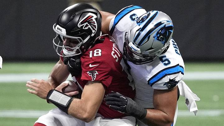 Sep 20, 2026; Atlanta, Georgia, USA; Atlanta Falcons quarterback Jack Strand (18) is sacked by Carolina Panthers linebacker Jaelan Phillips (5) during the third quarter at Mercedes-Benz Stadium. Mandatory Credit: Dale Zanine-Imagn Images Sep 20, 2026; Atlanta, Georgia, USA; Atlanta Falcons quarterback Jack Strand (18) is sacked by Carolina Panthers linebacker Jaelan Phillips (5) during the third quarter at Mercedes-Benz Stadium. Mandatory Credit: Dale Zanine-Imagn Images