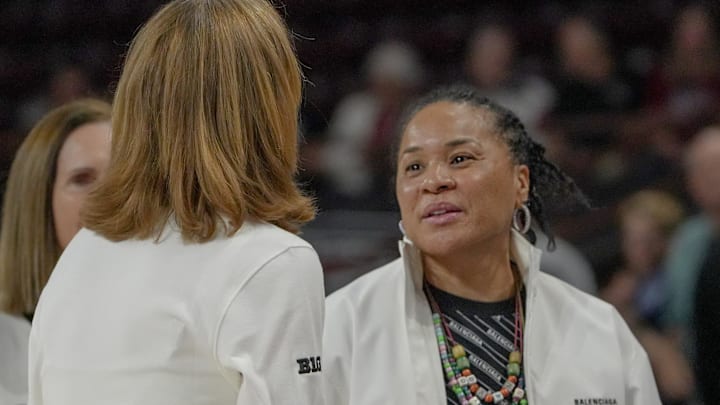 South Carolina Coach Dawn Staley, right, greets University of Southern California Head Coach Lindsay Gottlieb before tipoff Monday, March 23, 2026, NCAA Women's Basketball Tournament at Colonial Life Arena in Columbia, South Carolina.
