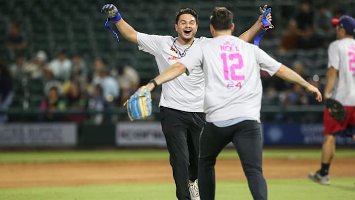 King grad Dustin Saenz celebrates a run during a celebrity softball game at Whataburger Field as part of Trevi's Homecoming, Friday, Dec. 8, 2023, in Corpus Christi, Texas.