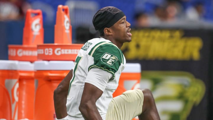 DeSoto's Ethan Feaster warms up after halftime during Friday's game at the Alamodome on Sept. 13, 2024, in San Antonio, Texas. DeSoto's Ethan Feaster warms up after halftime during Friday's game at the Alamodome on Sept. 13, 2024, in San Antonio, Texas.