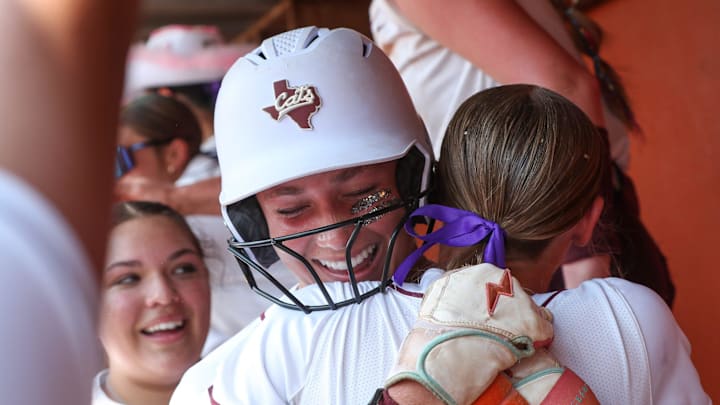 Calallen's Braelyn Bailey (center) was named MVP of the 2025 UIL Class 4A Division I state championship game after clubbing a grand slam and finishing with 6 RBI in the Lady Wildcats' 9-2 victory on Friday, May 30, 2025 at McCombs Field in Austin.