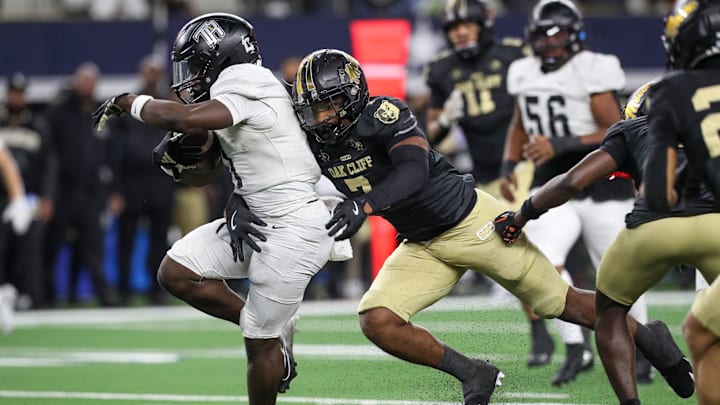 South Oak Cliff's Jamarion Phillips tackles Richmond Randle's Landen Williams-Callis during the Class 5A, Division II State Championship game on Friday, Dec. 20, 2024, at AT&T Stadium in Arlington, Texas.
