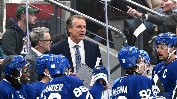 Sep 19, 2026; Toronto, Ontario, CAN;  Toronto Maple Leafs head coach Jim Hiller speaks to his players during a time-out against the Montreal Canadiens in the third period at Scotiabank Arena.  Mandatory Credit: Dan Hamilton-Imagn Images