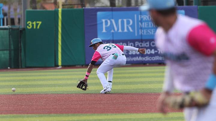 Daytona shortstop Carlos Sanchez (33) reaches for grounder as first baseman Carter Graham moves to cover first during the Tortugas' first home game of the 2024 season against Palm Beach, Tuesday, April 9, 2024, at Jackie Robinson Ballpark. Daytona shortstop Carlos Sanchez (33) reaches for grounder as first baseman Carter Graham moves to cover first during the Tortugas' first home game of the 2024 season against Palm Beach, Tuesday, April 9, 2024, at Jackie Robinson Ballpark.