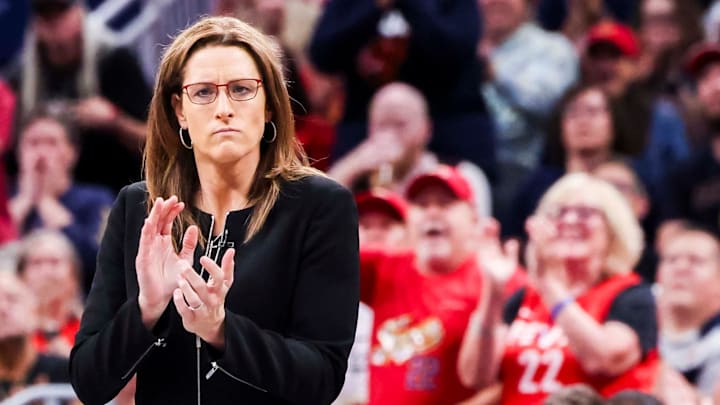 Indiana Fever head coach Stephanie White cheers for her team Saturday, June 14, 2025, during a game between the Indiana Fever and the New York Liberty at Gainbridge Fieldhouse in Indianapolis. The Indiana Fever defeated the New York Liberty, 102-88. Indiana Fever head coach Stephanie White cheers for her team Saturday, June 14, 2025, during a game between the Indiana Fever and the New York Liberty at Gainbridge Fieldhouse in Indianapolis. The Indiana Fever defeated the New York Liberty, 102-88.