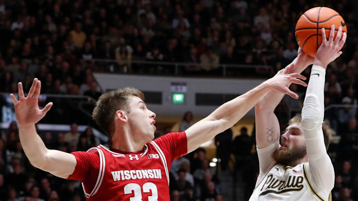 Wisconsin Badgers guard Jack Janicki (33) defends Purdue Boilermakers guard Braden Smith (3) Saturday, Feb. 15, 2025, during the NCAA men’s basketball game at Mackey Arena in West Lafayette, Ind. Wisconsin Badgers won 94-84. Wisconsin Badgers guard Jack Janicki (33) defends Purdue Boilermakers guard Braden Smith (3) Saturday, Feb. 15, 2025, during the NCAA men’s basketball game at Mackey Arena in West Lafayette, Ind. Wisconsin Badgers won 94-84.