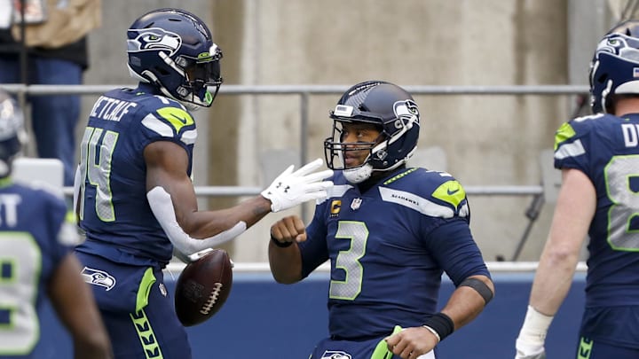 Dec 13, 2020; Seattle, Washington, USA; Seattle Seahawks quarterback Russell Wilson (3) celebrates with wide receiver DK Metcalf (14) following a second quarter touchdown pass against the New York Jets at Lumen Field. Mandatory Credit: Joe Nicholson-Imagn Images Dec 13, 2020; Seattle, Washington, USA; Seattle Seahawks quarterback Russell Wilson (3) celebrates with wide receiver DK Metcalf (14) following a second quarter touchdown pass against the New York Jets at Lumen Field. Mandatory Credit: Joe Nicholson-Imagn Images