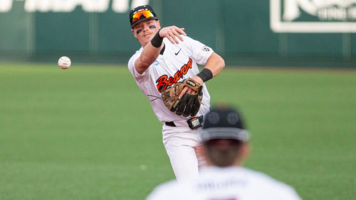 Oregon State's Travis Bazzana throws to first base against Tulane in the Corvallis Regional of the NCAA Tournament Friday, May 31, 2024, at Goss Stadium in Corvallis, Ore. Oregon State's Travis Bazzana throws to first base against Tulane in the Corvallis Regional of the NCAA Tournament Friday, May 31, 2024, at Goss Stadium in Corvallis, Ore.