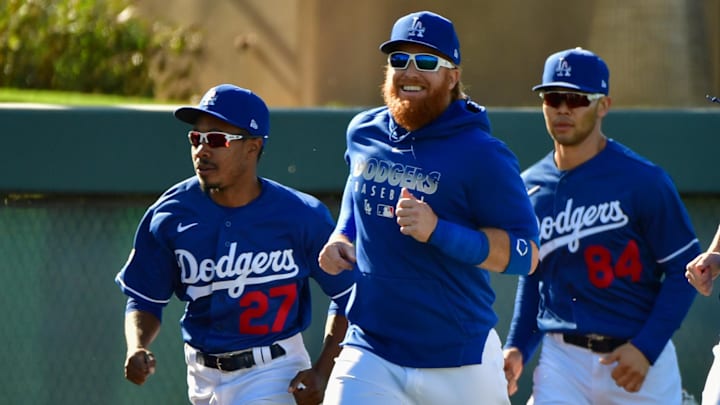 Feb 18, 2020; Glendale, Arizona, USA;  Los Angeles Dodgers third baseman Justin Turner (10), outfielder Terrance Gore (27) and infielder Connor Joe (84) run during a workout at Camelback Ranch.  Mandatory Credit: Matt Kartozian-Imagn Images