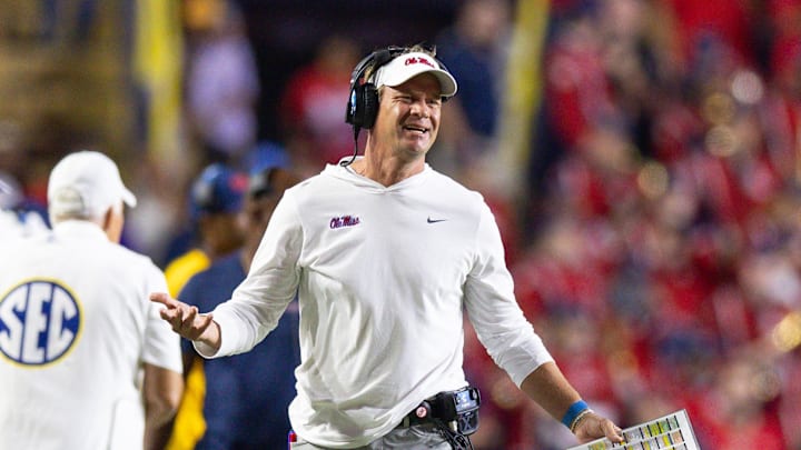 Oct 12, 2024; Baton Rouge, Louisiana, USA;  Mississippi Rebels head coach Lane Kiffin reacts after a play against the LSU Tigers during the second half at Tiger Stadium. Mandatory Credit: Stephen Lew-Imagn Images
