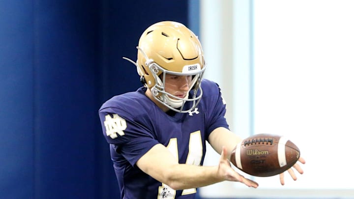 Punter Bryce McFerson (14) practices his technique Saturday, March 25, 2023, at Notre Dame spring