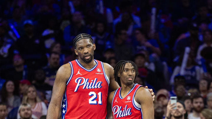 Apr 12, 2024; Philadelphia, Pennsylvania, USA; Philadelphia 76ers center Joel Embiid (21) and guard Tyrese Maxey - Bill Streicher/USA Today Sports