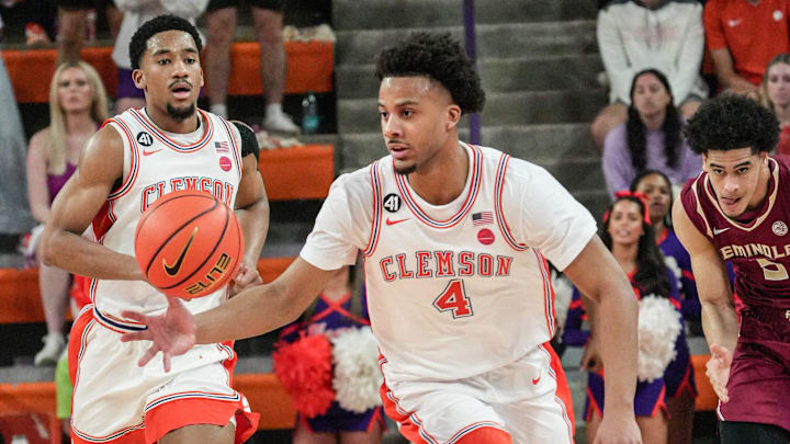 Clemson guard Butta Johnson (4) brings the ball upcourt against Florida State University during the second half at Littlejohn Coliseum in Clemson, S.C Saturday, February 21, 2026. Clemson guard Butta Johnson (4) brings the ball upcourt against Florida State University during the second half at Littlejohn Coliseum in Clemson, S.C Saturday, February 21, 2026.
