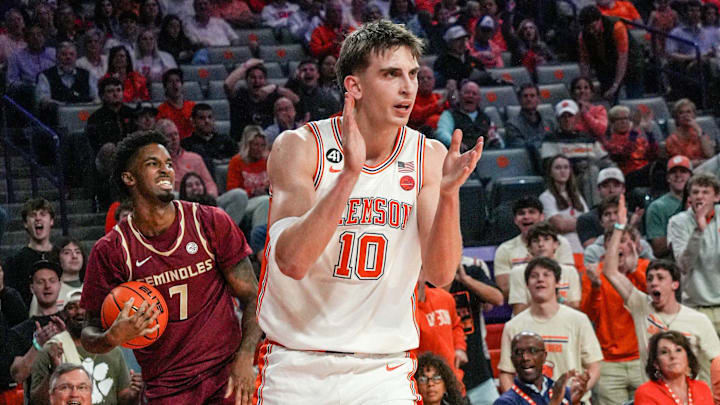 Clemson guard Jake Wahlin (10) reacts after defending Florida State University forward Chauncey Wiggins (7) during the first half at Littlejohn Coliseum in Clemson, S.C Saturday, February 21, 2026.