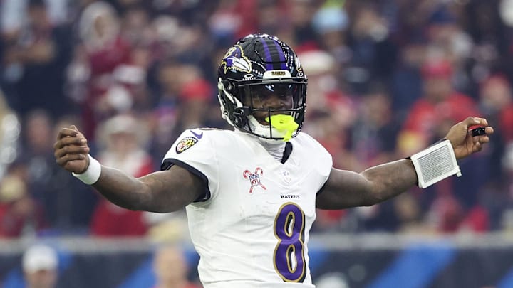 Baltimore Ravens quarterback Lamar Jackson reacts under center against the Houston Texans. Mandatory Credit: Thomas Shea-Imagn Images