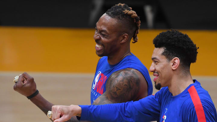 Mar 25, 2021; Los Angeles, California, USA; Philadelphia 76ers center Dwight Howard (39) and Philadelphia 76ers forward Danny Green (14) react as they receive their 2020 NBA Championship rings before the game against the Los Angeles Lakers at Staples Center. Mandatory Credit: Jayne Kamin-Oncea-Imagn Images Mar 25, 2021; Los Angeles, California, USA; Philadelphia 76ers center Dwight Howard (39) and Philadelphia 76ers forward Danny Green (14) react as they receive their 2020 NBA Championship rings before the game against the Los Angeles Lakers at Staples Center. Mandatory Credit: Jayne Kamin-Oncea-Imagn Images