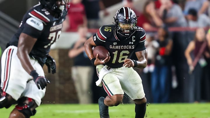 Sep 27, 2025; Columbia, South Carolina, USA; South Carolina Gamecocks quarterback LaNorris Sellers (16) scrambles against the Kentucky Wildcats in the second half at Williams-Brice Stadium. Mandatory Credit: Jeff Blake-Imagn Images