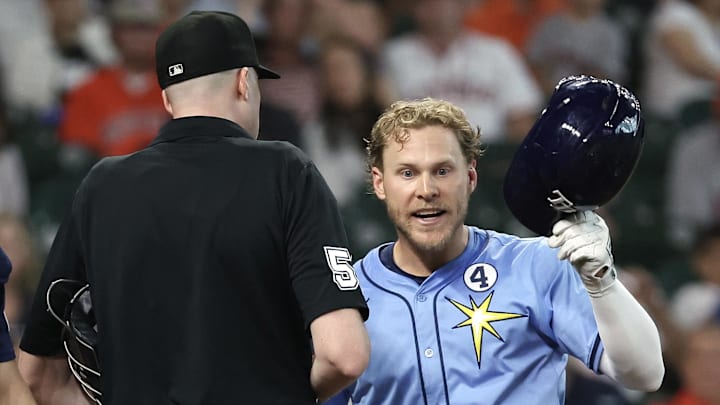  Tampa Bay Rays shortstop Taylor Walls was ejected by umpire Nic Lentz Sunday after Walls tapped his helmet with his hand.
