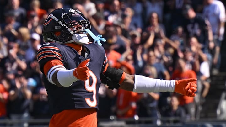 Oct 6, 2024; Chicago, Illinois, USA; Chicago Bears safety Jaquan Brisker (9) celebrates a defensive stop against the Carolina Panthers during the first quarter at Soldier Field. Mandatory Credit: Daniel Bartel-Imagn Images