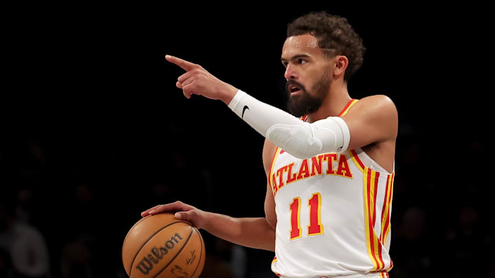 Apr 10, 2025; Brooklyn, New York, USA; Atlanta Hawks guard Trae Young (11) controls the ball against the Brooklyn Nets during the third quarter at Barclays Center. Mandatory Credit: Brad Penner-Imagn Images