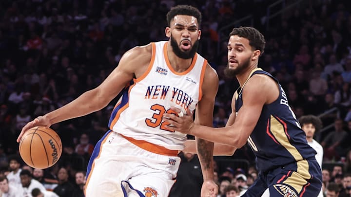 New York Knicks center Karl-Anthony Towns (32) looks to drive past New Orleans Pelicans forward Jeremiah Robinson-Earl (50) in the second quarter at Madison Square Garden. Mandatory Credit: Wendell Cruz-Imagn Images