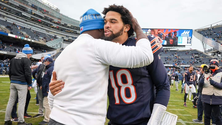 Detroit Lions defensive coordinator Aaron Glenn embraces Chicago Bears quarterback Caleb Williams (18) after a game at Soldier Field in Chicago, Ill., on Sunday, Dec. 22, 2024.