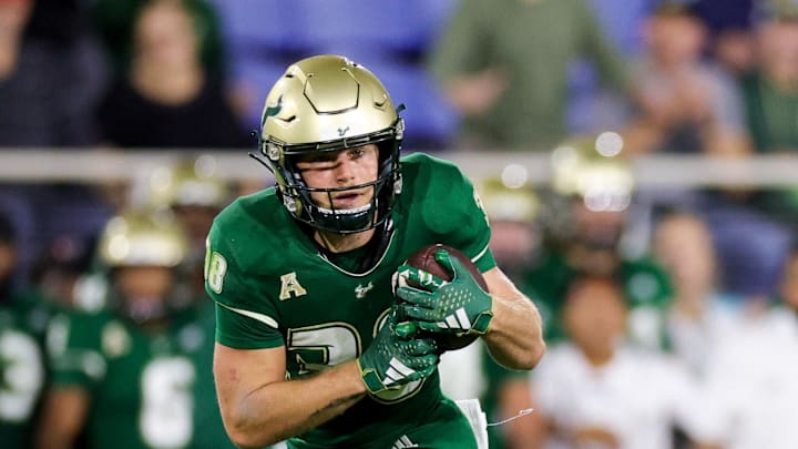 Dec 21, 2023; Boca Raton, FL, USA;  South Florida Bulls wide receiver Sean Atkins (38) catches a pass for a touchdown against the Syracuse Orange in the third quarter during the RoofClaim.com Boca Raton Bowl at FAU Stadium. Mandatory Credit: Nathan Ray Seebeck-USA TODAY Sports