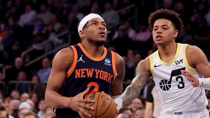 Jan 30, 2024; New York, New York, USA; New York Knicks guard Miles McBride (2) drives to the basket against Utah Jazz guard Keyonte George (3) during the first quarter at Madison Square Garden. Mandatory Credit: Brad Penner-Imagn Images