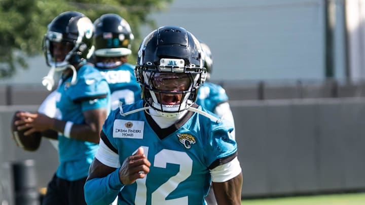Jacksonville Jaguars wide receiver Travis Hunter (12) runs a passing drill during the Jacksonville Jaguars’ third mandatory minicamp Thursday June 12, 2025 at the Miller Electric Center in Jacksonville, Fla.