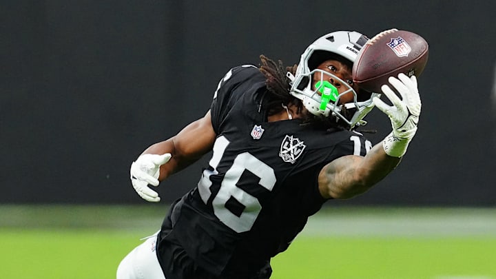 Sep 29, 2024; Paradise, Nevada, USA; Las Vegas Raiders wide receiver Jakobi Meyers (16) attempts to make a catch against the Cleveland Browns during the third quarter at Allegiant Stadium. Mandatory Credit: Stephen R. Sylvanie-Imagn Images