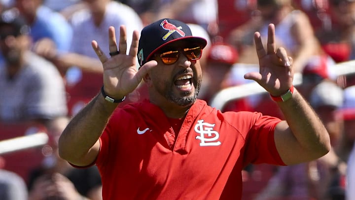 Aug 17, 2025; St. Louis, Missouri, USA;  St. Louis Cardinals manager Oliver Marmol (37) reacts after he was ejected from the game by umpire Nic Lentz (59) during the seventh inning against the New York Yankees at Busch Stadium. Mandatory Credit: Jeff Curry-Imagn Images