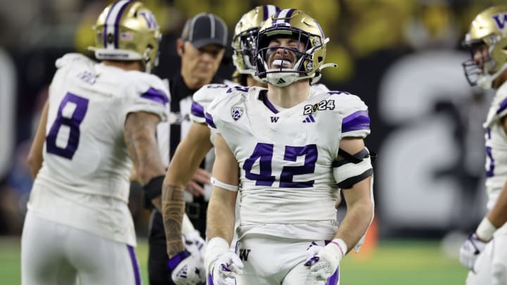 UW linebacker Carson Bruener lets out his emotions in the CFP title game. 