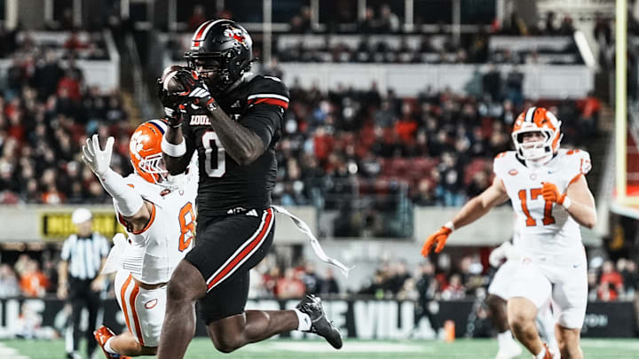 Louisville Cardinals wide receiver Chris Bell (0) got close to the end zone but officials ruled against his touchdown after a replay review as the Cards take on Clemson in the first half at L&N Stadium Friday, Nov. 14, 2025.