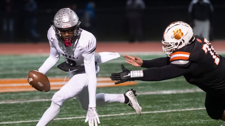 Harrisburg quarterback Shawn Lee Jr. escapes a sack attempt from Central York's Danny Pham during a PIAA District 3 Class 6A semifinal game at Central York High School on Friday, Nov. 18, 2022, in Emigsville.
Hes Dr 111822 Cyfb Harrisburg quarterback Shawn Lee Jr. escapes a sack attempt from Central York's Danny Pham during a PIAA District 3 Class 6A semifinal game at Central York High School on Friday, Nov. 18, 2022, in Emigsville.
Hes Dr 111822 Cyfb