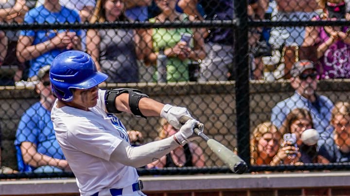 Whitefish Bay's Mitch Voit (1) connects for a single to left during the game against Arrowhead at Cahill Park in Whitefish Bay on Saturday, May 14, 2022 Whitefish Bay's Mitch Voit (1) connects for a single to left during the game against Arrowhead at Cahill Park in Whitefish Bay on Saturday, May 14, 2022