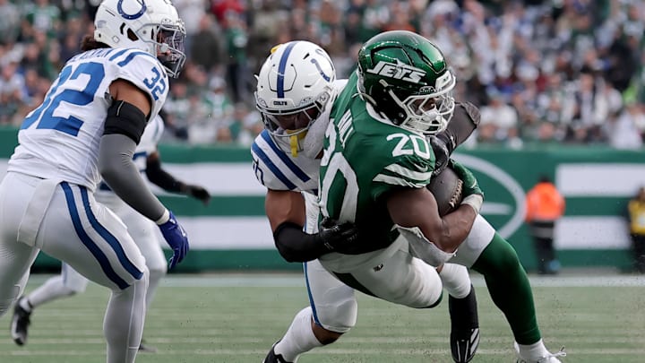 Indianapolis Colts safety Nick Cross (20) tackles New York Jets running back Breece Hall (20) during the fourth quarter at MetLife Stadium.